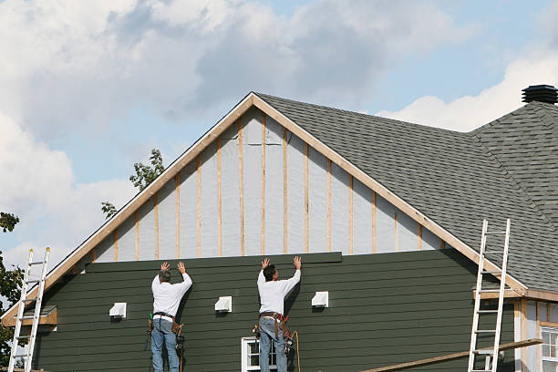 Professional Siding technician working in Bridgeport, NY